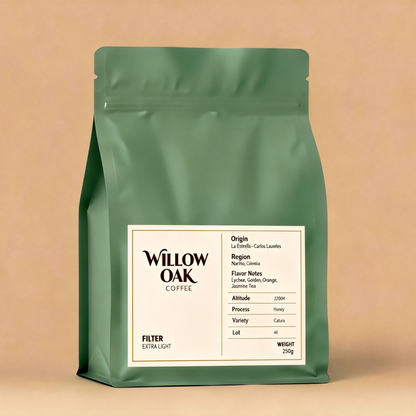 Green coffee bag with 'Willow Oak' label on a beige background
